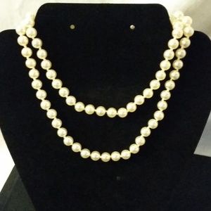 Pearl colored long stranded necklace